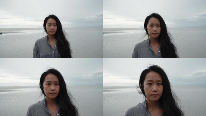 海滩上悲伤女人的肖像