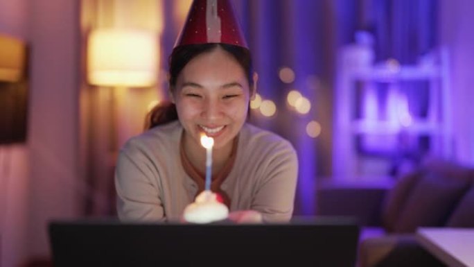 亚洲妇女在生日那天与朋友进行视频通话