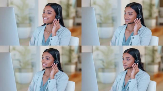 在咨询客户服务和销售支持时使用耳机的呼叫中心电话营销代理。自信的年轻女商人在操作服务台时微笑着，看上