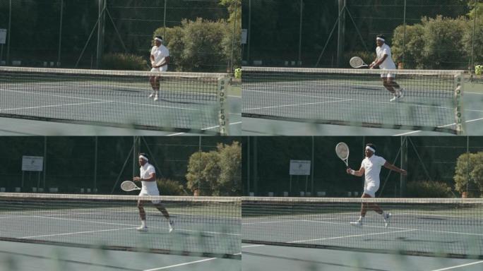 一个年轻人在球场上打网球的4k录像