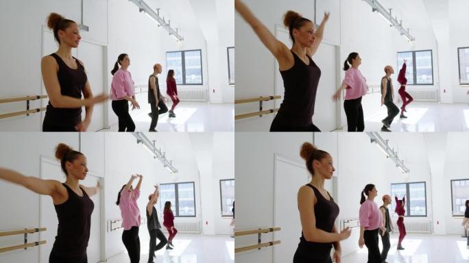 在健身工作室里跳尊巴舞的多种族人士