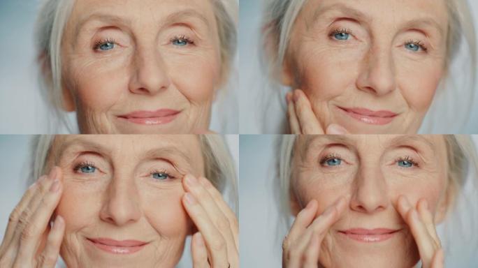 美丽的高级女人轻轻涂抹面霜的特写肖像。老年女士用天然抗衰老化妆品使皮肤柔软、光滑、无皱纹。美容护肤产