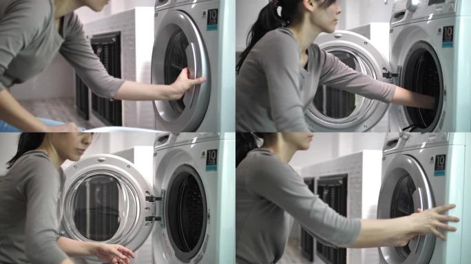 女人在家洗衣服女人在家洗衣服洗衣机