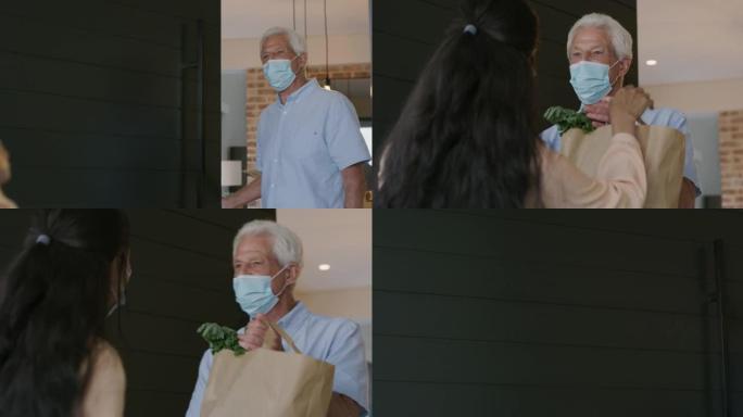 一名妇女向老年顾客运送食物的4k录像
