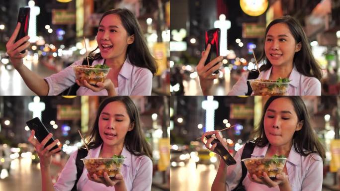 年轻女孩拍泰国街头美食照片