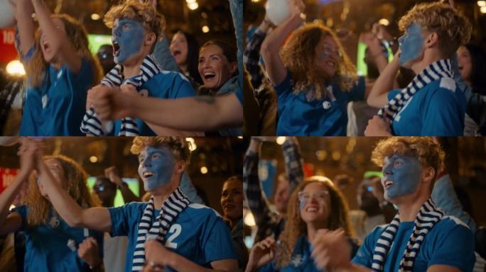 一群在体育酒吧直播足球比赛中，脸上涂着彩绘的球迷欢呼，尖叫，举手和跳跃。球员进球，朋友们庆祝。慢动作