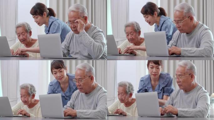 一群年龄在60-70岁之间的亚洲高级学生，他们参加了针对初学者的计算机培训课程，这是他们高级成人教育