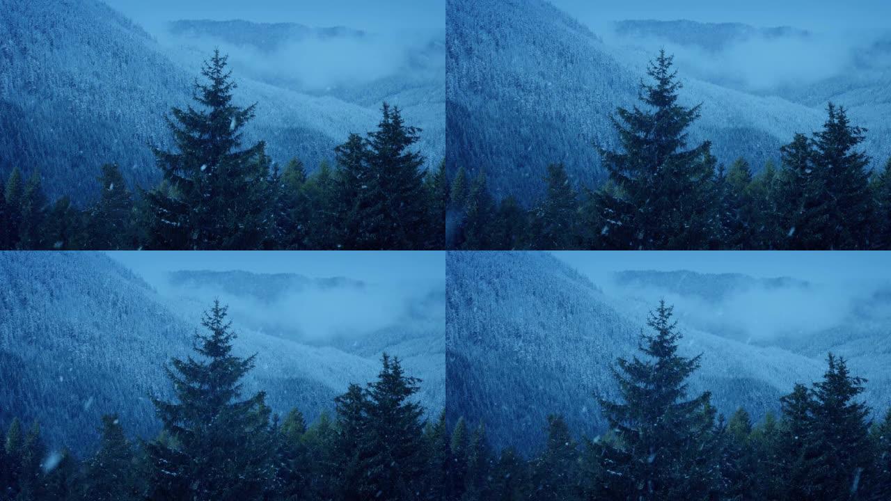 黄昏时山区景观上的降雪