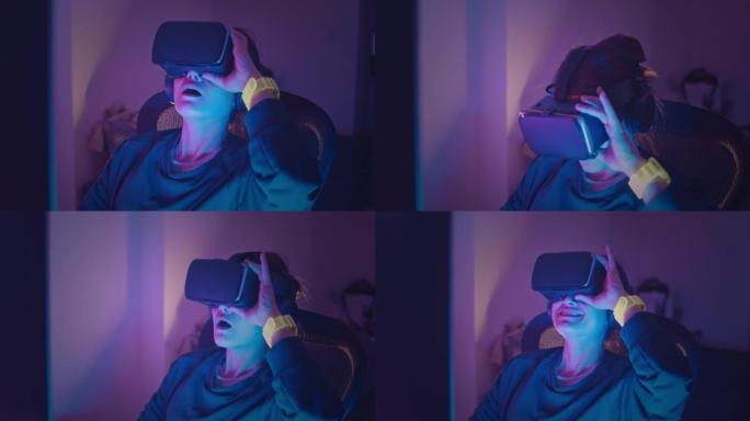 女人在vr耳机里玩游戏，在虚拟现实世界里玩得开心