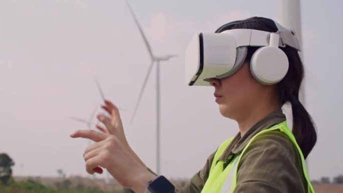 在户外工厂工作时戴着VR眼镜的工程师妇女