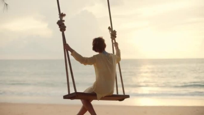 Traveler asian woman travel and relax on swing at 
