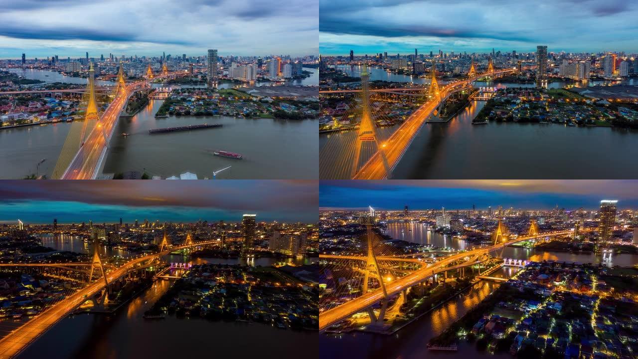 泰国曼谷夜间，普密蓬悬索桥穿越曼谷市湄南河，夜间在桥上行驶。