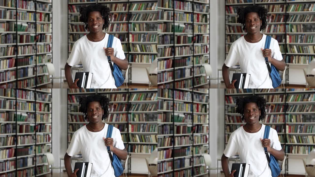 微笑的z世代黑人潮男学生站在图书馆