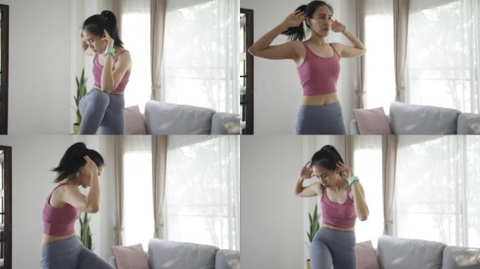 女人在家锻炼健美操健身运动女人在家锻炼