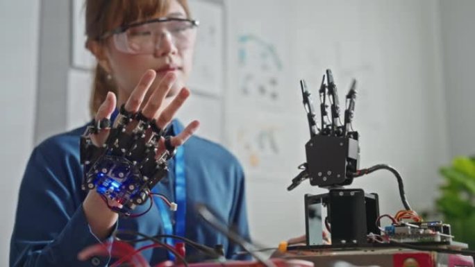 未来派假肢机器人工程师控制移动手指