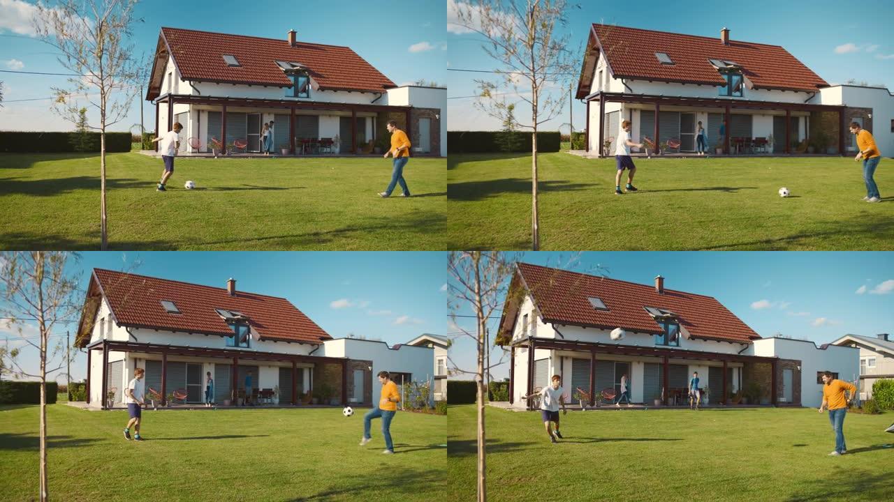 SLO MO父子在独立屋的草坪上踢足球