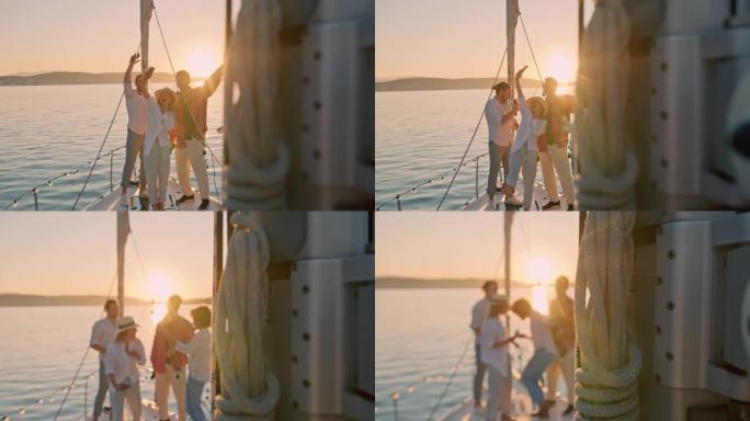 SLO MO一群朋友玩得开心，在日落时在船的甲板上自拍