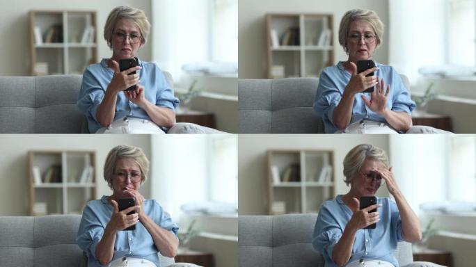老年妇女在使用现代智能手机时遇到问题