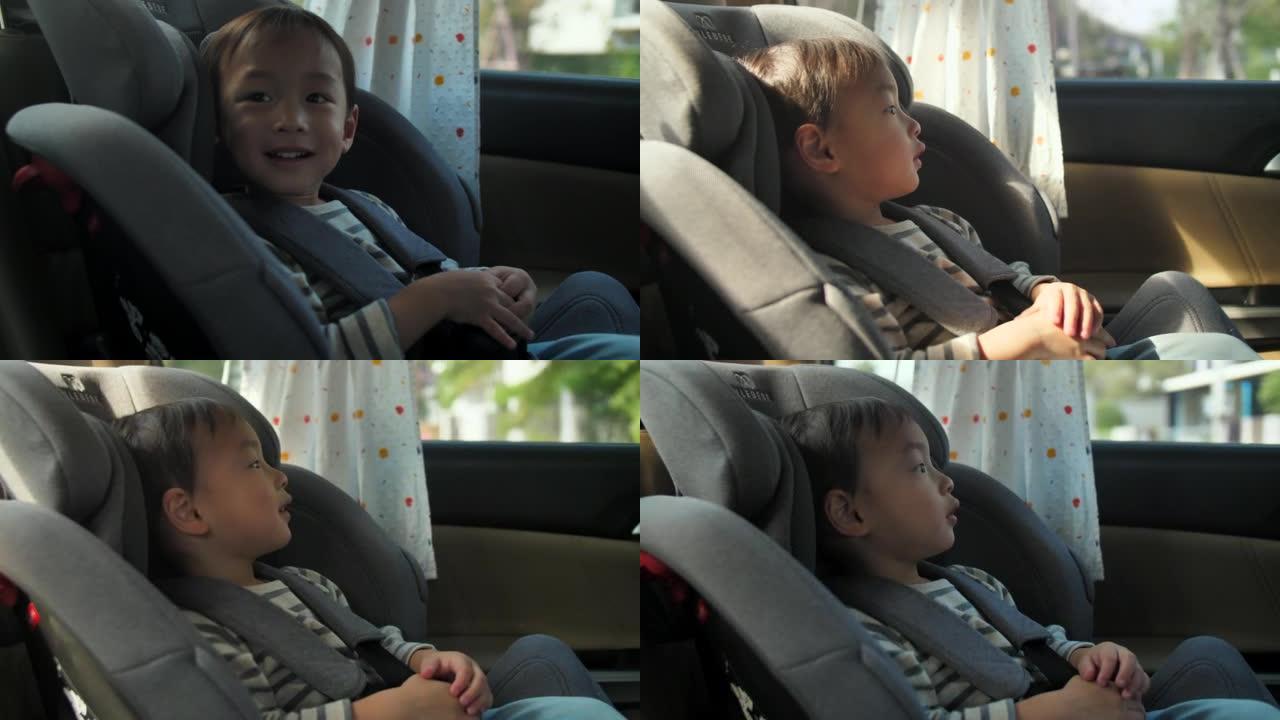 婴儿坐在安全汽车座椅上