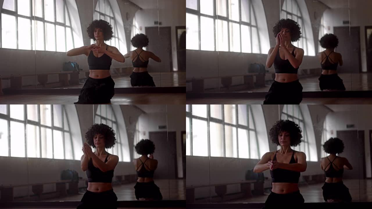 黑人妇女在工作室做瑜伽冥想