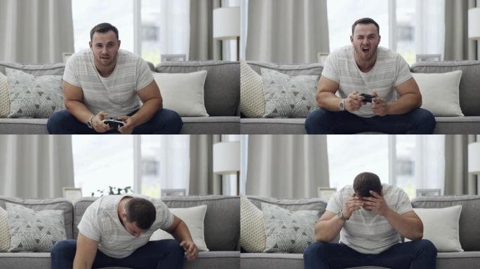 4k视频片段，一名男子在家中玩电子游戏时感到沮丧