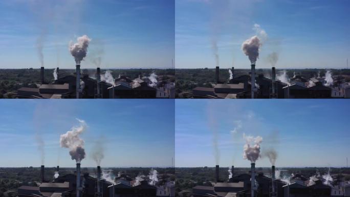 烟熏烟囱空气污染的化工厂的鸟瞰图。环境问题，工作中的世界无人机视图概念。