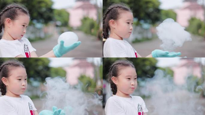 SLO MO可爱亚洲小女孩玩肥皂泡