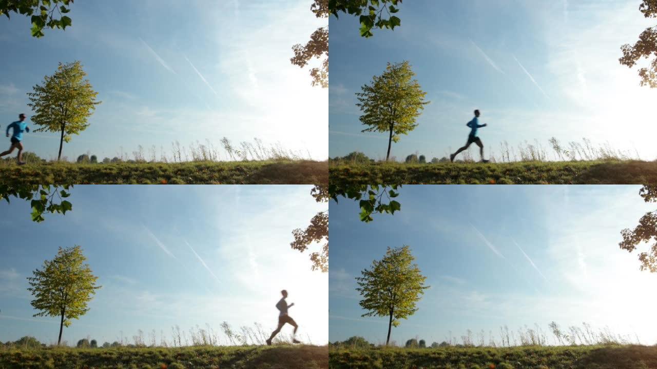 4k视频片段，一名男子在公园里奔跑