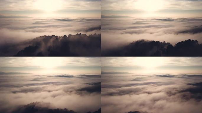 在早晨日出时间，云雾和天空上方的空中拍摄