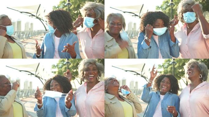三名非裔美国高级妇女摘下口罩