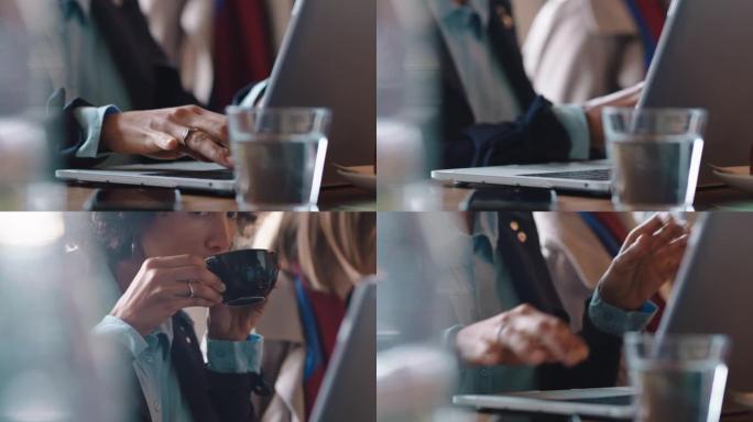 关闭商务女性在咖啡馆使用笔记本电脑在线打字电子邮件网络享受在繁忙的餐厅喝咖啡