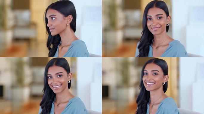 公司办公室里一个快乐的女商人的脸。年轻自信的印度企业家或时尚营销设计师站在室内明亮的现代公司办公室微