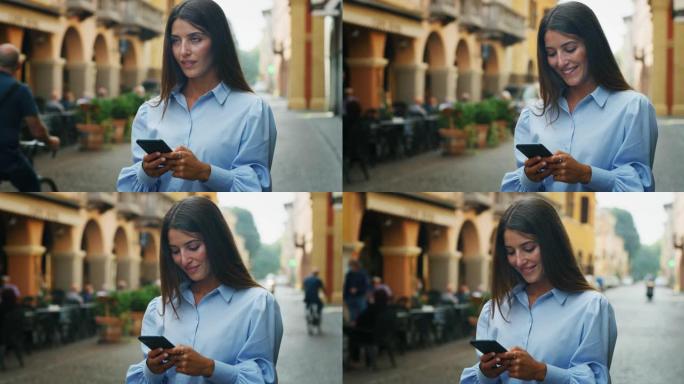 在阳光明媚的日子里，一位年轻的微笑女子正在使用智能手机发送消息，拨打电话或在老城区的互联网上导航。概