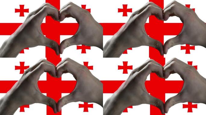 双手在乔治亚旗上显示心形标志。