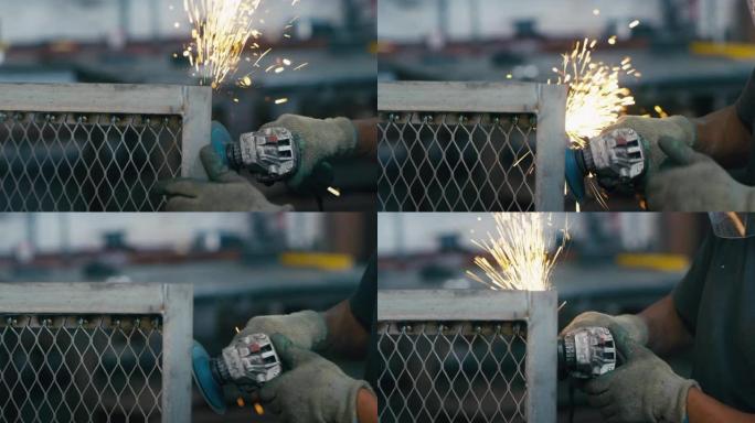 金属火花，工具和建筑工人在工厂里用手缩放砂轮。仓库，工业厂房工作和工人在金属铸造厂使用砂轮和切割机