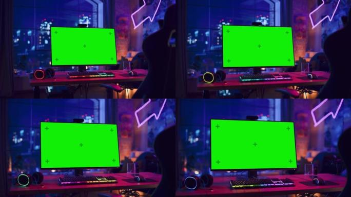 在家玩游戏: 空的游戏站，玩家的个人电脑，绿屏色度键显示站在带霓虹灯的时尚阁楼公寓的木桌上。放大镜头
