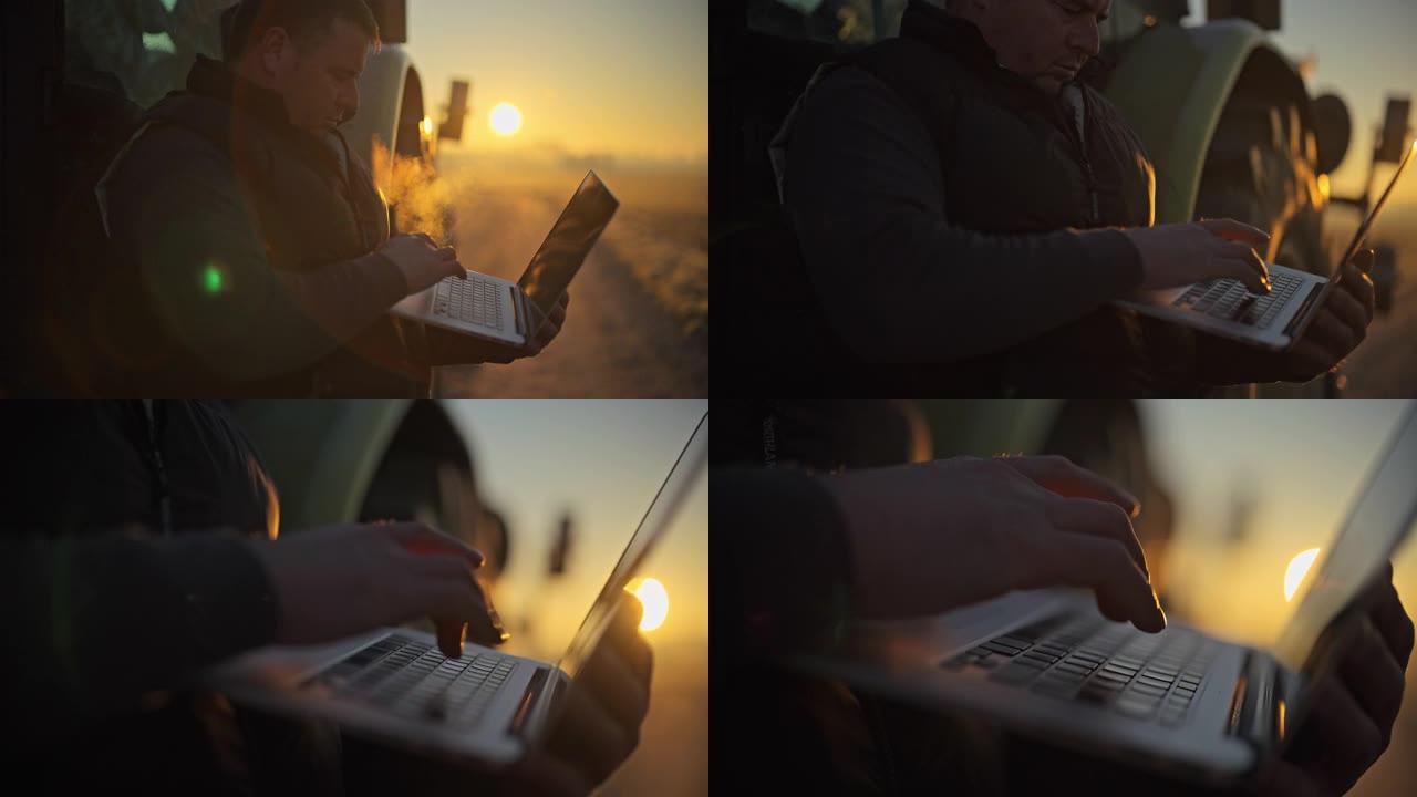 男性农民在日出时在农村地区使用笔记本电脑在拖拉机上工作