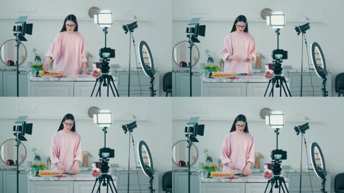 视频工作室，一位女士在做饭时被拍摄