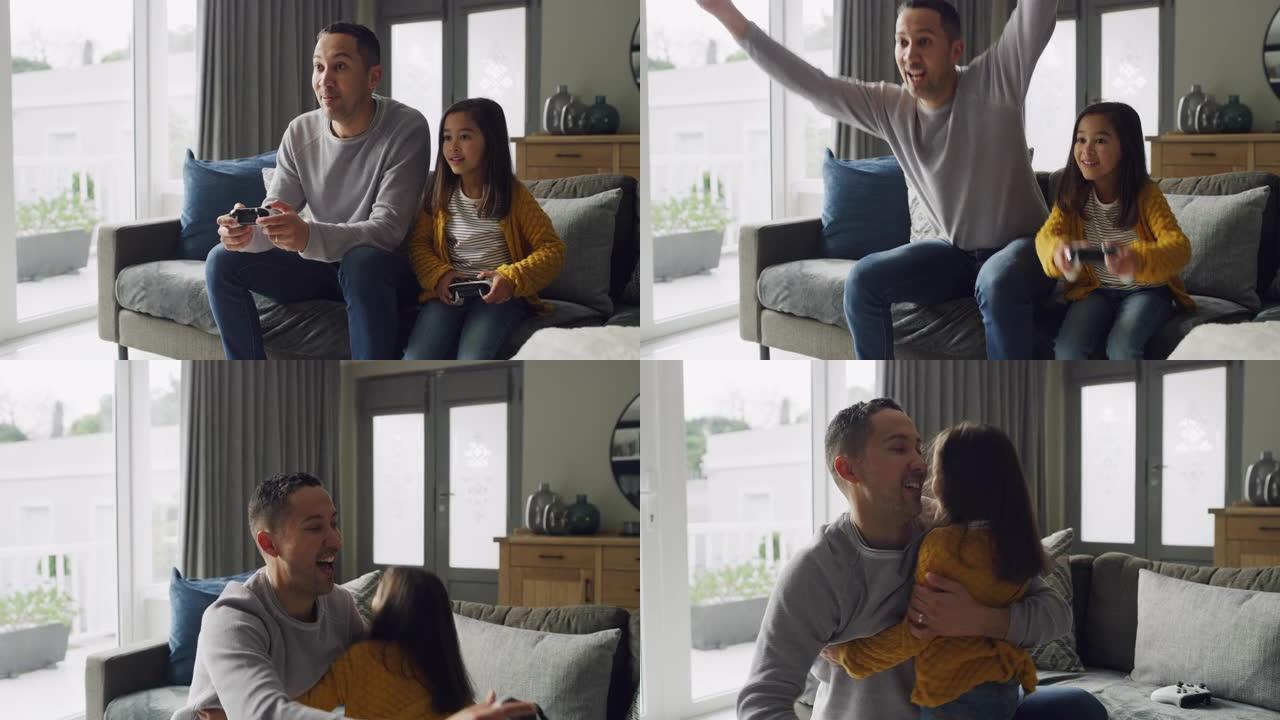 一个父亲和女儿在家里的沙发上玩电子游戏的4k视频片段