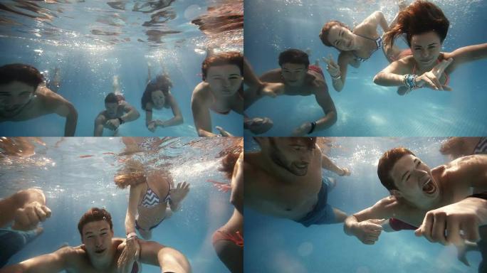 朋友在水下游泳