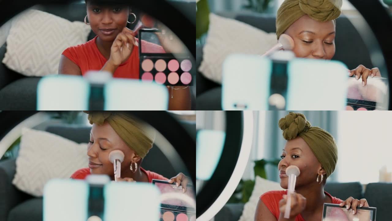化妆，实时流媒体和有影响力的黑人女性在智能手机上进行化妆品评论，社交媒体广告和博客。视频录制，客厅工