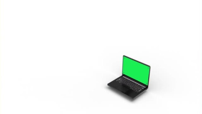 白色背景的黑色笔记本电脑上的绿色屏幕