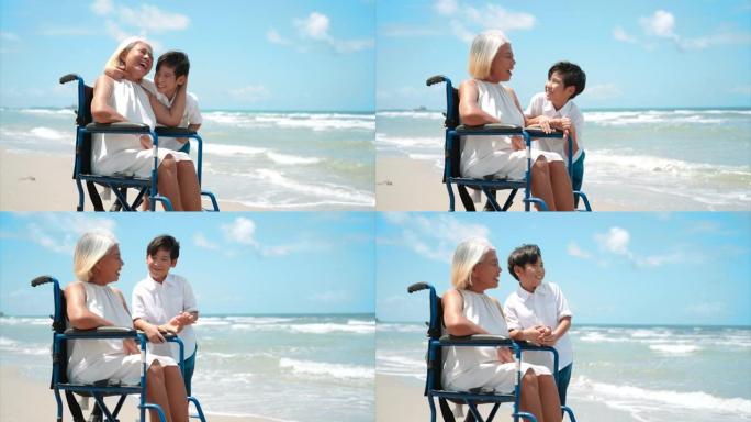 孙子正在轮椅上给祖母一个情感上的拥抱