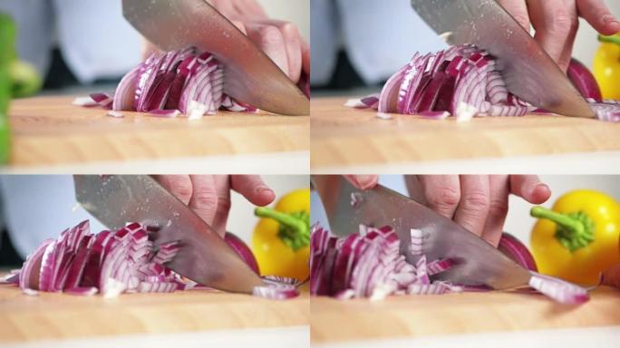 4k视频片段，一名男子切碎红洋葱准备用餐