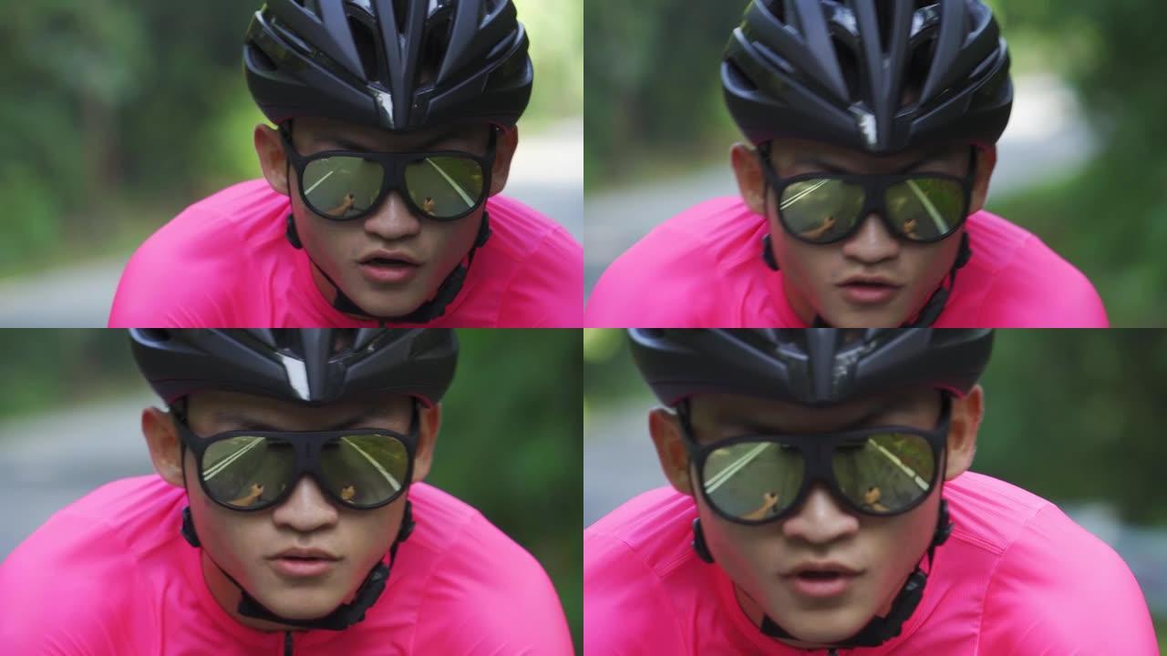 亚洲华裔男运动员独自在农村地区骑自行车