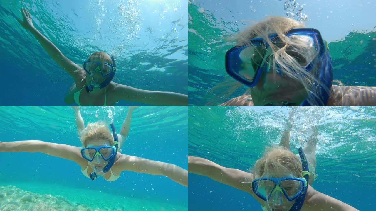 女士肖像年轻女子在克罗地亚阳光明媚的亚得里亚海水下浮潜