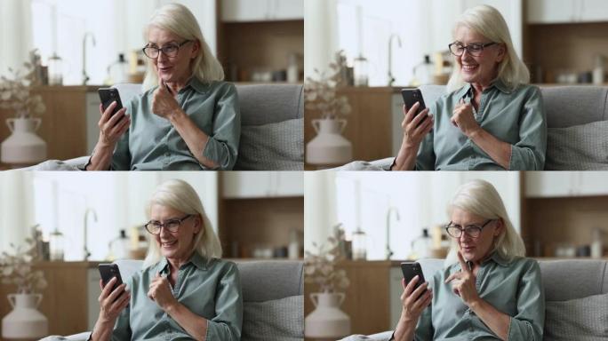 女人使用智能手机和可视电话应用程序喜欢与家人交谈