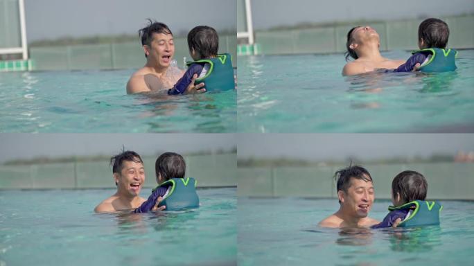 夏天在游泳池里扮演鲸鱼的父子角色扮演