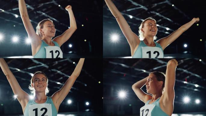 职业女运动员的肖像愉快地庆祝体育锦标赛的新纪录。确定成功的女运动员在获得金牌后举起手臂。静态中弹