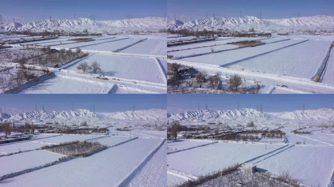 航拍山下农村田园雪景